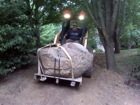 how to move large rocks with a skid steer|best way to move rocks.